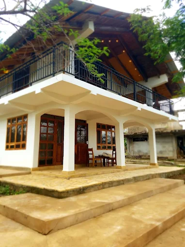 Open veranda with wooden doors by day
